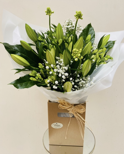 Forever Yours - Show your affection with this fabulous hand-tied  featuring white oriental lilies and foliage.