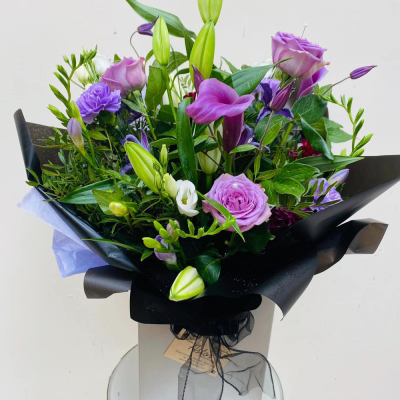 Cool Breeze - This classical stylish collection of flowers, make this hand tied the perfect gift. Flowers professionally arranged and delivered by a local florist.