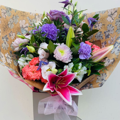 Out of this World - Looking for that ultimate gift that's out of this world!? Look no further. This fabulous hand-tied of the finest and freshest blooms is all you need to make a lasting impression...