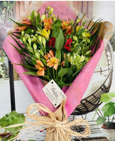 Wrap of Colour - This simply wrapped collection of long lasting Alstroemeria will make your message just that bit more special.