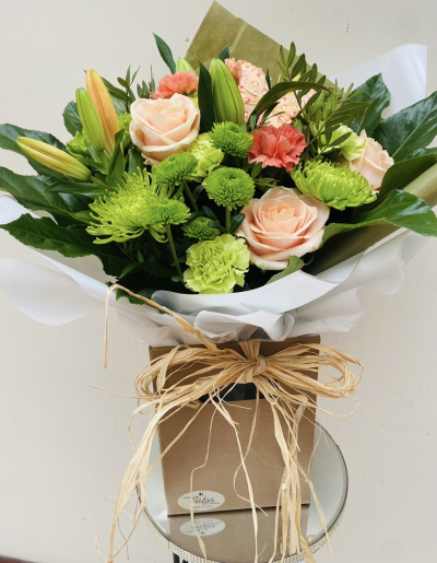 Sunrise - Energise their day with a stunning surprise. A warm collection of seasonal flowers artistically arranged by an artistic florist.