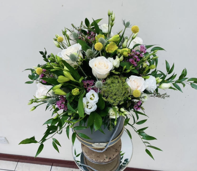 A New Day - Flowers to put a smile on their face. Let them know that you’re thinking of them with this fun petite collection of flowers and foliage to send same day. Flowers for same day delivery by the local florist.